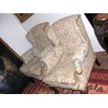 A pair of antique wing easy chairs with carved cab