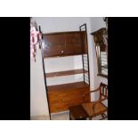 A retro ladder-rack teak and metal wall unit with