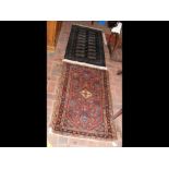 Two small Middle Eastern rugs