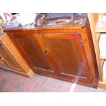 An antique cupboard - width 111cm