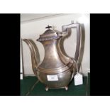 A silver coffee pot with Sheffield hallmark