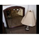 A bevelled wall mirror in mahogany surround, toget