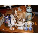 A medley of collectable china, including Hummel fi