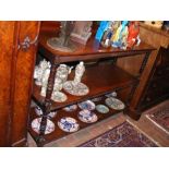 A Victorian three tier mahogany buffet on turned s