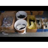 Various containers and boxes of new fishing hooks