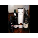 Three bottles of Port and a bottle of Madeira