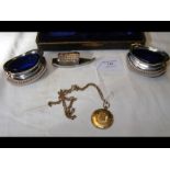A pair of silver table salts in presentation case,