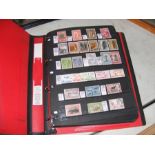 A comprehensive album containing stamps from aroun