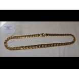 A '750' marked gold curb link necklace