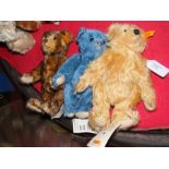 Three collectable Steiff teddy bears with buttons