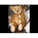 A large Hermann teddy bear with labels - 62cms