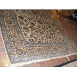 A large Middle Eastern carpet with geometric borde