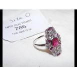 An Art Deco style 9ct white gold ruby and diamond