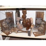 A medley of carved wooden figures, including multi