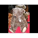 A large Steiff collectable teddy bear with button