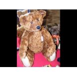 A large Steiff brown mohair teddy bear with button