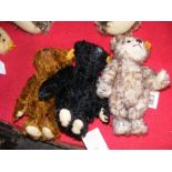 Three collectable Steiff teddy bears with buttons