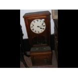 An old oak cased clocking in clock - 91cm high