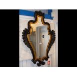 An antique style shaped wall mirror- 94cms