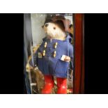 A Paddington bear with original labels and welling