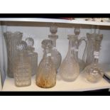 A selection of glass decanters and vases