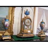 A 19th century French three piece clock set, the d