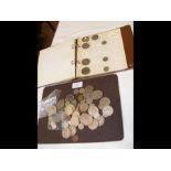 A coin book containing various coinage, many 1947,