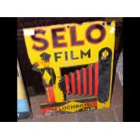 A vintage enamel sign - 'Selochrome Film' - badly