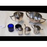 Various silver condiments and plated items
