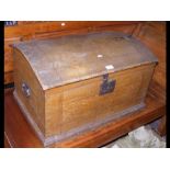 A 19th century pine domed chest with original scum