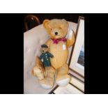 A large straw filled teddy together with vintage d