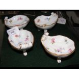A set of four Meissen 'shell' table salts with flo