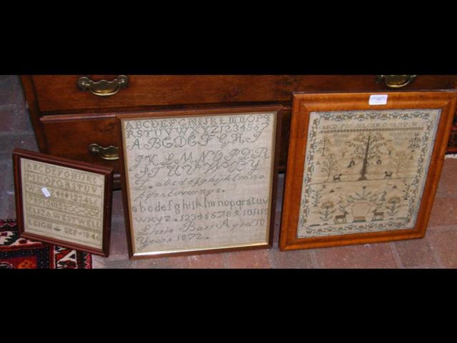 A 19th century sampler, together with two others