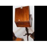 An antique mahogany reading stand with drawers und