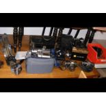 A medley of vintage camera equipment, including Ol