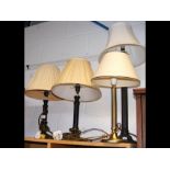 Four table lamps of varying shape and size