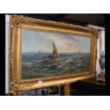 An oil on canvas of fishing boats in rough sea, in