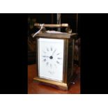 A brass cased carriage clock - 13cms high