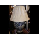 An Oriental style blue and white table lamp