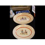 Two Clarice Cliff platters depicting children at p
