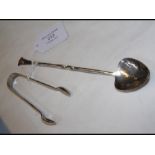 An Arts & Crafts style hammered silver spoon, make