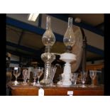 Two antique oil lamps, together with assorted sher