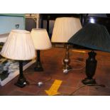 Four table lamps of varying shape and size