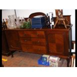 A mahogany sideboard with two short and two long d