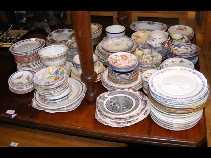 A medley of collectable plates and saucers