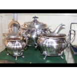 A three piece silver tea set with Sheffield hallma