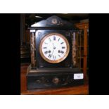A slate and marble mantel clock - width 22cm