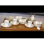 Victorian tea ware with trailing blue and green le