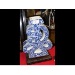 An old Chinese blue and white elaborate vase with
