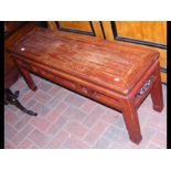 An Oriental rectangular bench